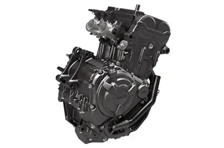 Motor bicilíndrico CP2 de Yamaha, diseñado para Moto3, mostrando su arquitectura y componentes internos.