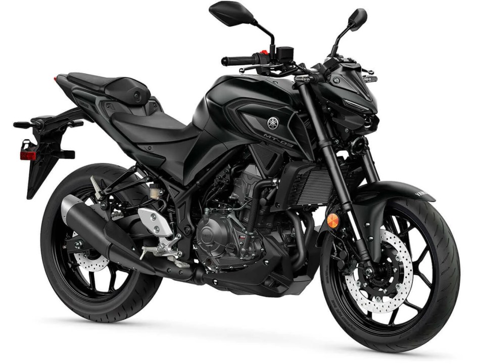 Yamaha MT-03 motorcycle in black, showcasing a modern streetfighter design with a sleek frame and aggressive stance.